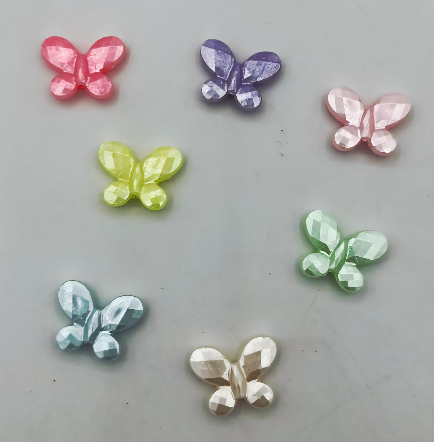 ENTREMEIO BORBOLETA 10mm  pacote 20 peças