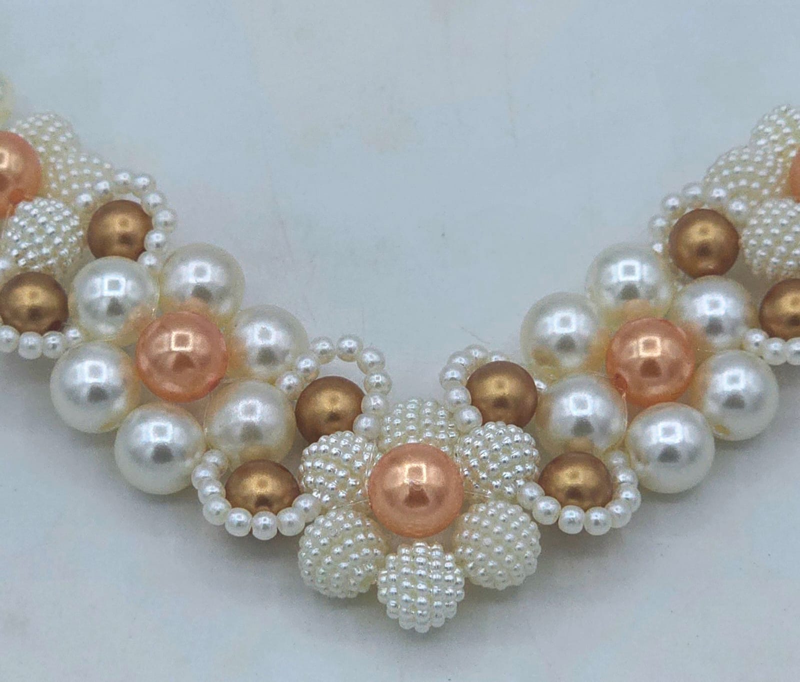 TRAMA CINCO FLORES PEROLADA